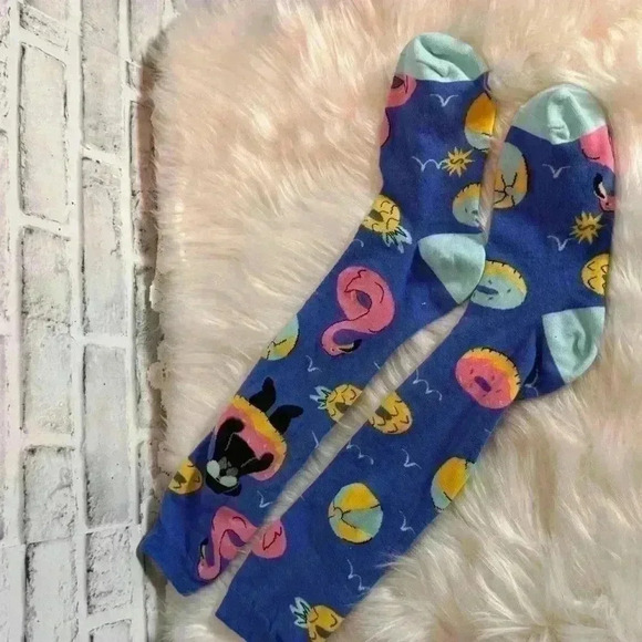 Dog socks‎ floating in pool with floatie pink flamingo float - Picture 3 of 4